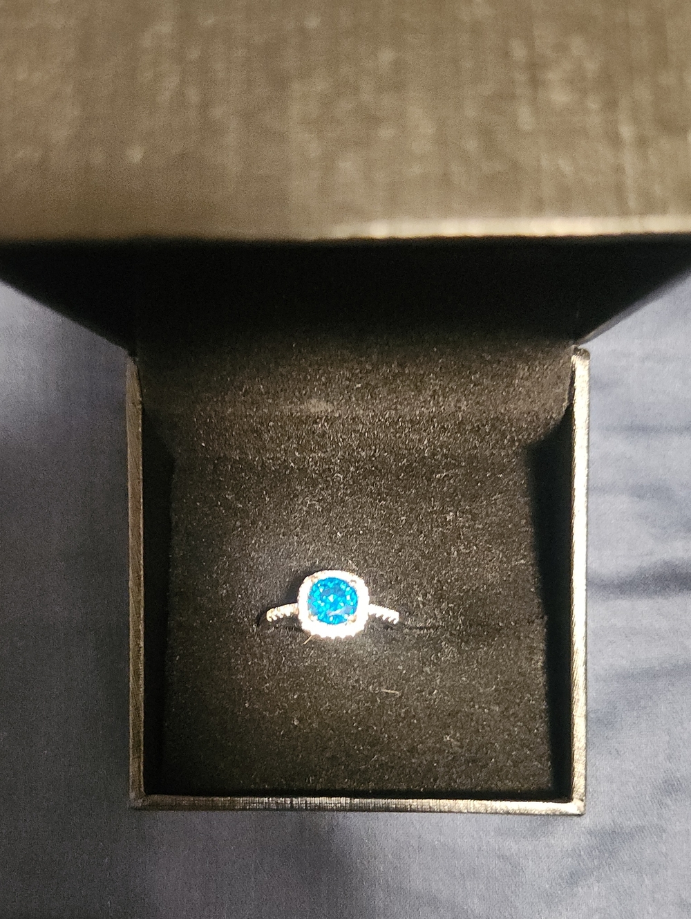 Elegant Silver Ring with Bright Blue Stone